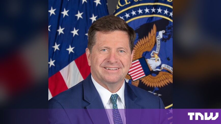 https://media.thenextweb.com/2026/10/jay-clayton-official-portrait-odni-seal-us-flag.jpg