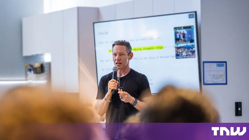 https://media.thenextweb.com/2026/10/jeff-holden-microphone-presentation-screen-office.jpg