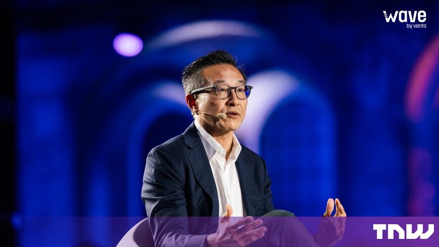https://media.thenextweb.com/2026/10/joe-tsai-alibaba-wave-by-vento-turin-speaking-gesturing.jpg