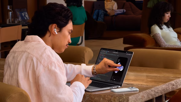 Apple’s touchscreen MacBook Pro keeps macOS familiar, Bloomberg finds