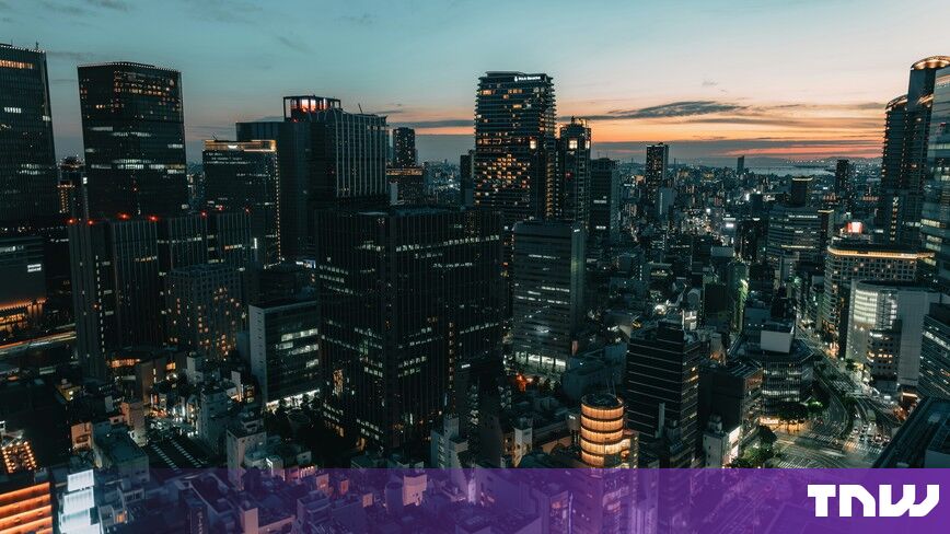 https://media.thenextweb.com/2026/10/osaka-umeda-skyline-dusk-office-towers.jpg