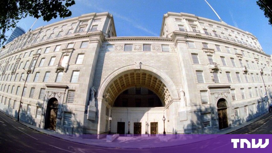 https://media.thenextweb.com/2026/10/thames-house-mi5-headquarters-london-arch-facade.jpg