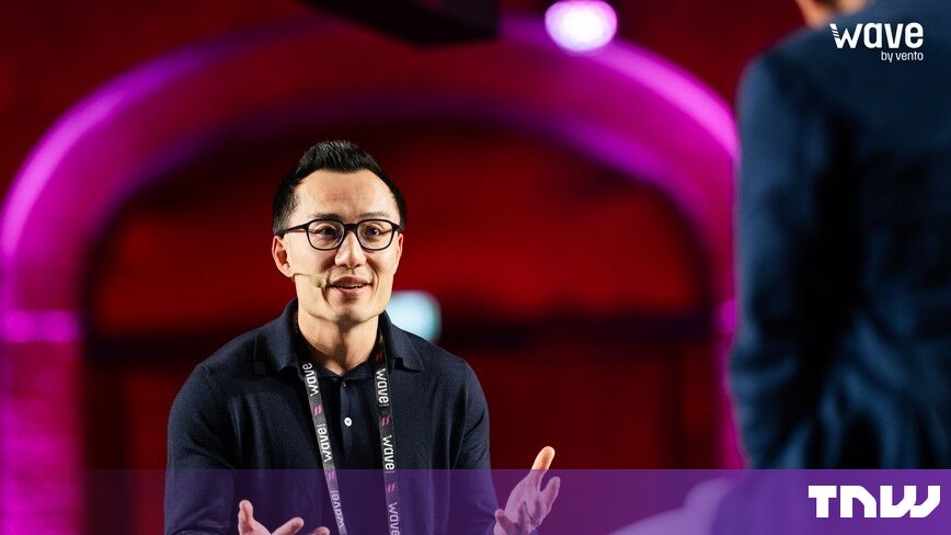 https://media.thenextweb.com/2026/10/tony-xu-doordash-wave-by-vento-turin-speaking-gesturing.jpg