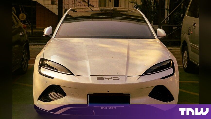 https://media.thenextweb.com/2026/10/white-byd-saloon-front-view-parking-lot.jpg